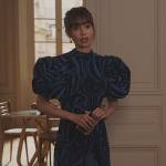 Emily’s blue printed puff sleeve top on Emily in Paris