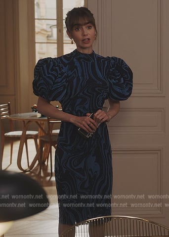 Emily’s blue printed puff sleeve top on Emily in Paris