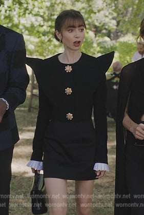 Emily’s black pointed shoulders top on Emily in Paris