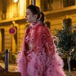 Emily’s feather cape and pink cutout dress on Emily in Paris Season 3