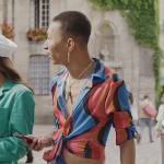 Etienne’s tiger stripe pants on Emily in Paris