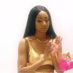 Guerdy’s gold metallic cutout dress on The Real Housewives of Miami
