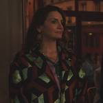 Marianne’s geometric jacquard coat on Emily in Paris