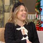 Joanna Teplin’s black contrast bow cardigan on Tamron Hall Show