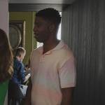 Julien’s pastel stripe polo on Emily in Paris