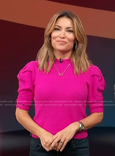 Kit’s pink puff sleeve sweater on Access Hollywood