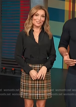 Kit’s plaid mini skirt on Access Hollywood
