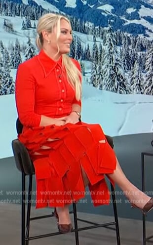 Lindsey Vonn’s red button down shirt and skirt on Access Daily