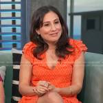 Lucy Devito’s orange ruffled mini dress on Access Hollywood