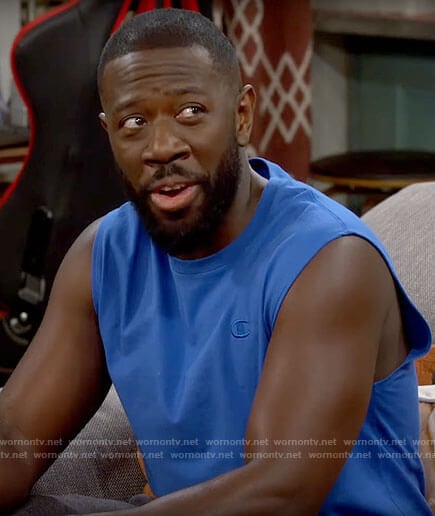 Malcolm’s blue tank top on The Neighborhood