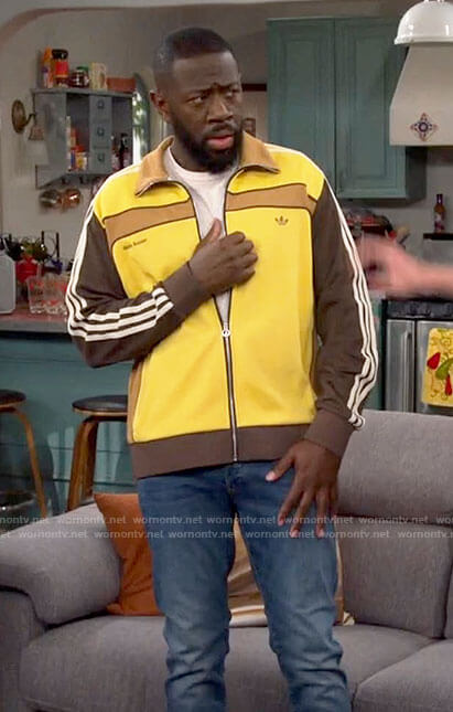 Malcolm’s yellow and brown track jacket on The Neighborhood