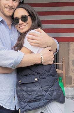 Meghan Markle’s navy puffer vest on Harry and Meghan