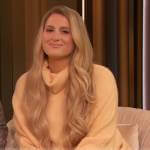 Meghan Trainor’s orange turtleneck sweater on The Drew Barrymore Show