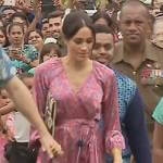 Meghan’s pink printed pom pom dress on Harry and Meghan