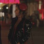 Mindy’s red medusa handbag on Emily in Paris