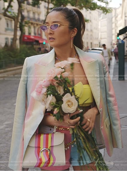 Mindy’s striped bag and sunglasses on Emily in Paris