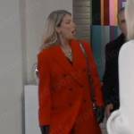 Nina’s long orange-red coat on General Hospital