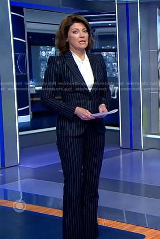 Norah’s navy pinstripe suit on CBS Evening News