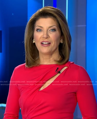 Norah’s red cutout dress and striped pumps on CBS Evening News