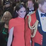 Meghan Markle’s red cape dress on Harry and Meghan