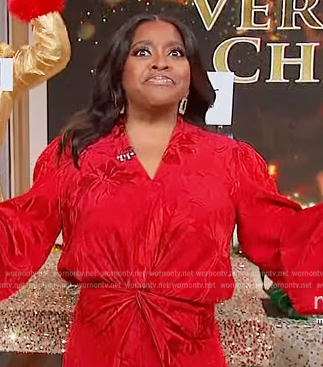 Sherri’s red floral twist jumpsuit on Sherri