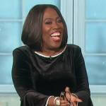 Sheryl’s black velvet bell sleeve top on The Talk