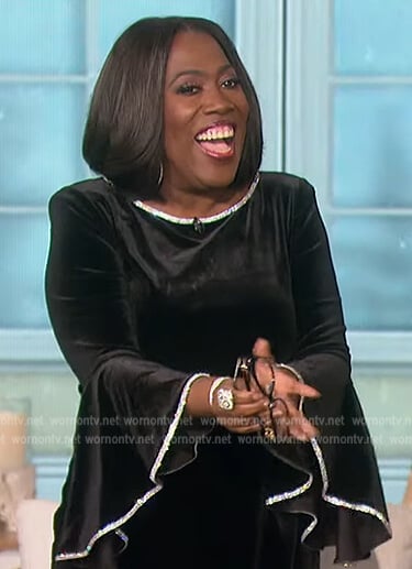 Sheryl’s black velvet bell sleeve top on The Talk