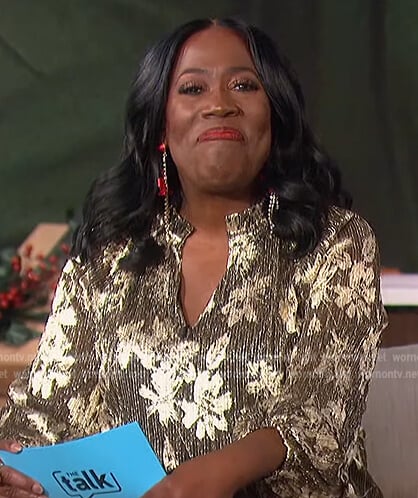 Sheryl’s metallic floral blouse on The Talk