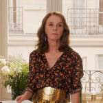Sylvie’s orange printed shirt and yellow skirt on Emily in Paris