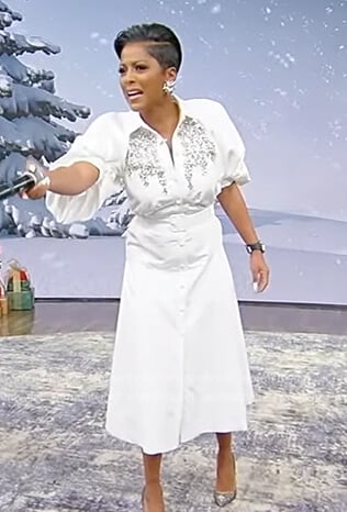 Tamron’s white embellished belted dress on Tamron Hall Show