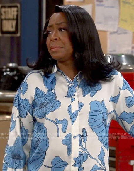 Tina’s blue and white floral shirt on The Neighborhood