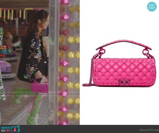 Valentino Garavani Pink Rockstud Spike Shoulder Bag worn by Mindy Chen (Ashley Park) on Emily in Paris