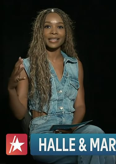 Zuri’s cutout denim jumpsuit on Access Hollywood