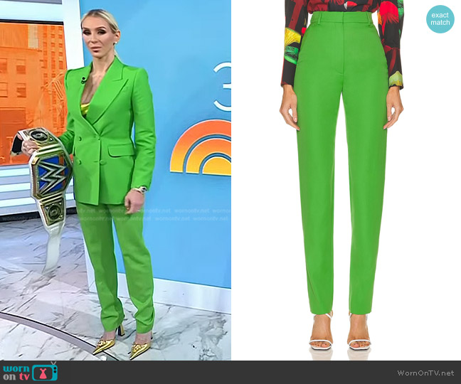 Alexander McQueen High-Waisted Cigarette Pants in Acid Green worn by Charlotte Flair on Today