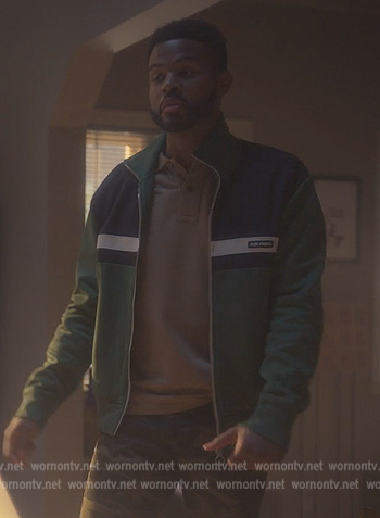 Aaron’s green zip down jacket on Grown-ish