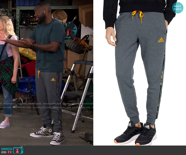 Adidas Camo 3-Stripes Pants worn by Malcom (Sheaun McKinney) on The Neighborhood