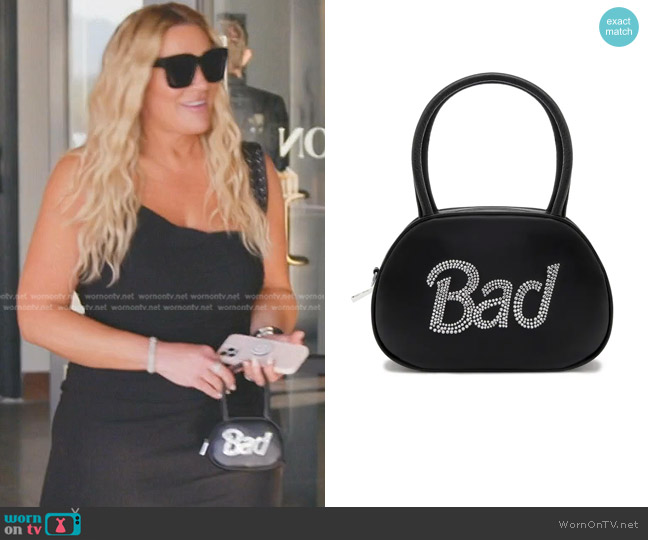Amina Muaddi Lambskin Leather Top Handle Bag worn by Heather Gay on The Real Housewives of Salt Lake City