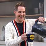 Anthony Underwood’s white cable knit cardigan on Good Morning America
