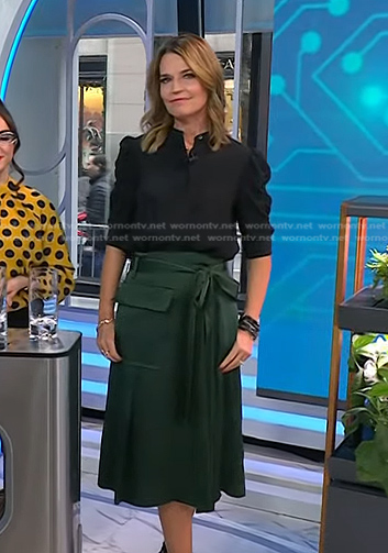Savannah’s black blouse and green satin wrap skirt on Today