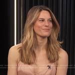 Brooke Jaffe’s beige top and sequin skirt on E! News