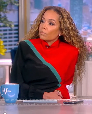Sunny’s colorblock sweater and skirt on The View