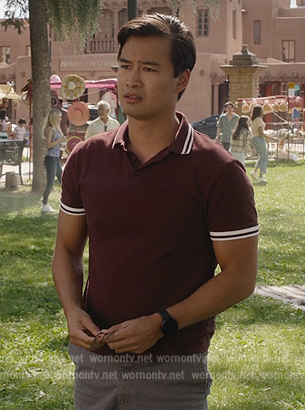 Ethan’s maroon stripe trim polo on National Treasure: Edge of History