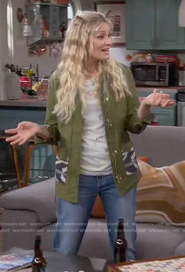 Gemma’s green jacket with printed pockets on The Neighborhood