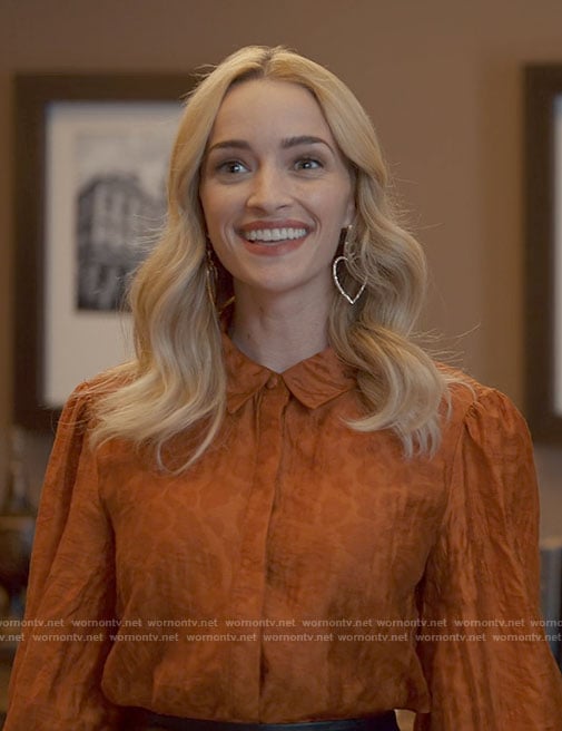 Georgia’s orange leopard blouse and heart earrings on Ginny & Georgia