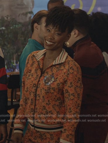 Grace’s orange floral print track jacket on All American