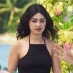 Helene’s black halter dress on Fantasy Island