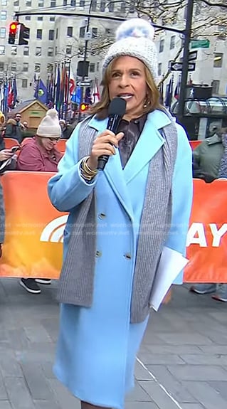 Hoda’s light blue coat and pom pom beanie on Today