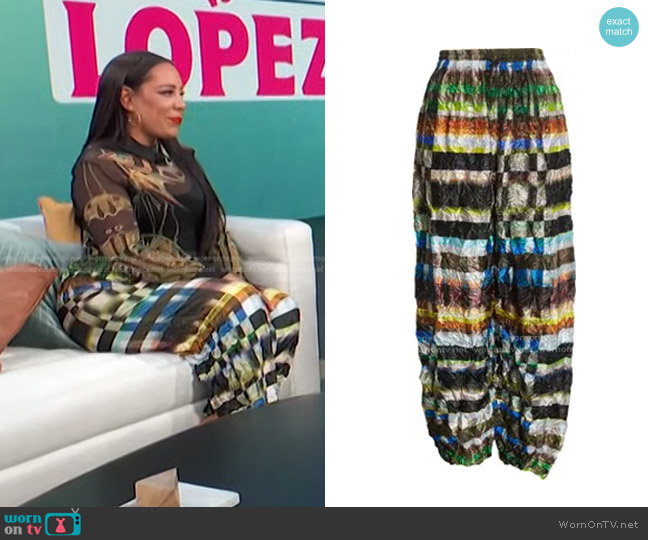 Julia Heuer Karl Check Crushed Satin Plissé Joggers worn by Selenis Leyva on Access Hollywood
