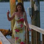 Julia’s yellow floral print dress on The Real Housewives of Miami