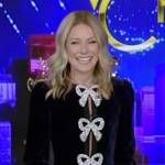 Kelly’s blue velvet bow embellished jumpsuit on Live with Kelly and Ryan
